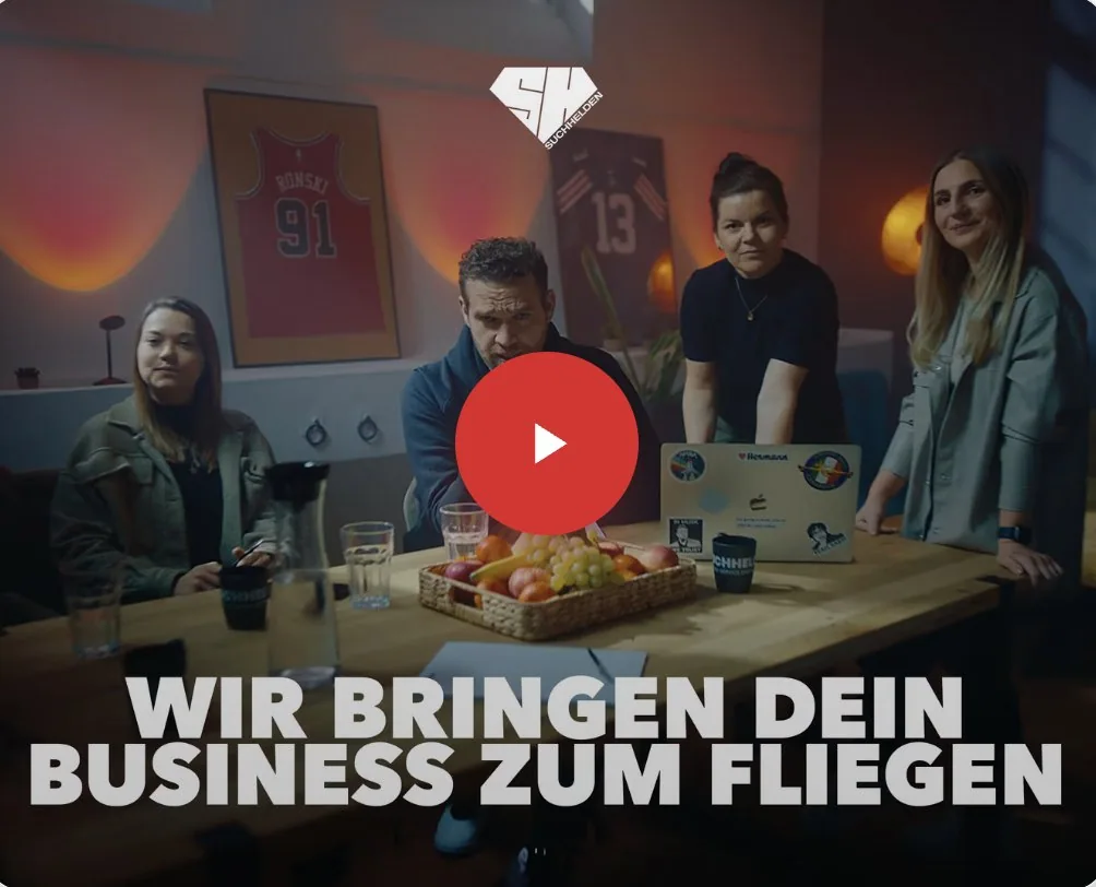 Das Suchhelden-Team am Besprechungstisch – Video: Wir bringen dein Business zum Fliegen